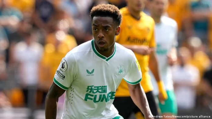 Newcastle United - in the footsteps of Manchester City and Newcastle player Joe Willock wears the green crest on the left chest