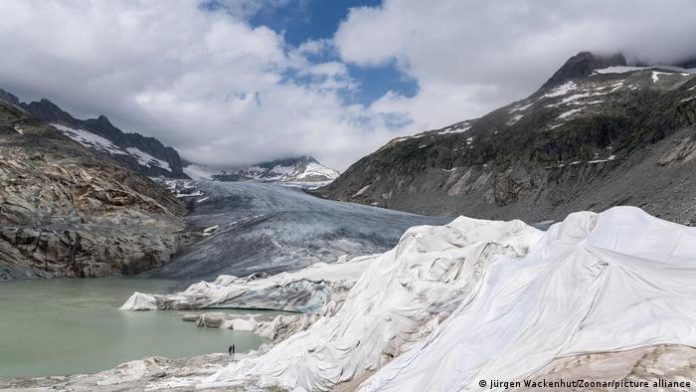 Rhone Glacier near Oberwald in Valais partially covered with white tarps